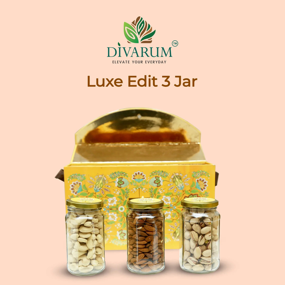 Inside The Luxe Edit nuts gift hamper by Divarum, featuring tins of almonds, cashews and pistachios.